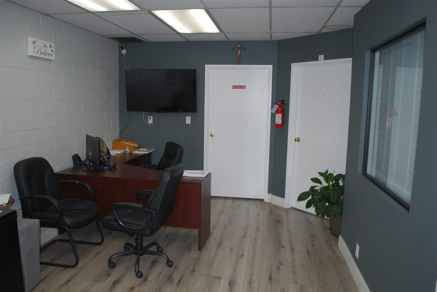 Original Insurance reception desk in the Downey office